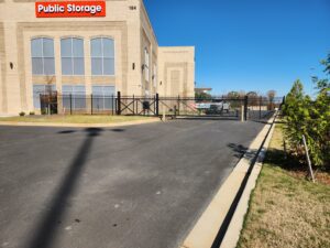 Storage facility with gated entrance and driveway, installed by Peachtree Fence & Gates