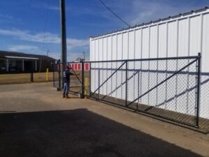Chain link cantilever gate at a storage facility, installed by Peachtree Fence & Gates