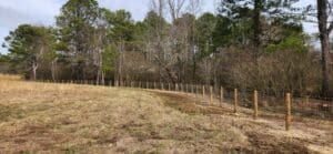 Wire pasture fence on a large farm in North Ga., installed by Peachtree Fence & Gates