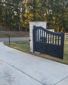 Modern Farmhouse driveway gate with operators in North Ga., installed by Peachtree Fence & Gates