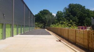 Wood fence at a storage facility, installed by Peachtree Fence & Gates