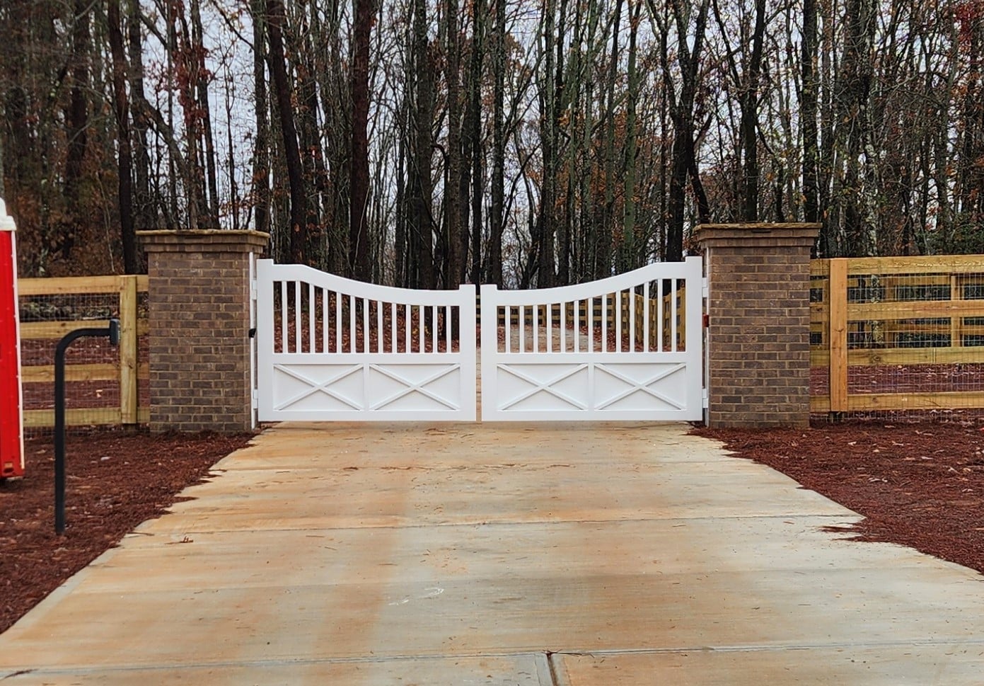 Modern farmhouse style estate gate with automatic operators in North Georgia, built & installed by Peachtree Fence & Gates